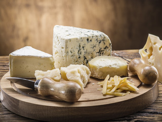 Variety of cheeses. Vintage stiles.