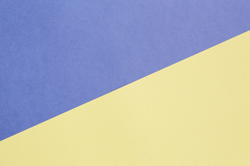 blue and yellow pastel background. Texture of fashion, minimal concept. Top view.