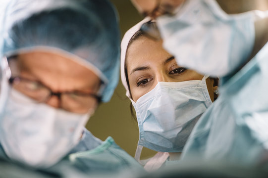 Close up of surgeons doing surgery in operating room