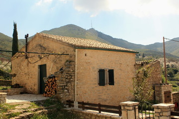 Fototapeta na wymiar stone house in greek mountains