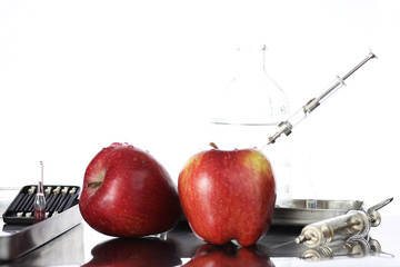Genetically modified foods, apple pumped with chemicals