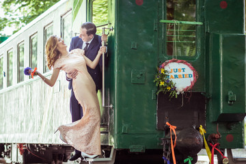 Couple on a ladder of wagon