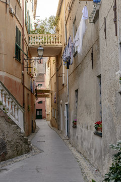 drying laundry and narrow lane, Finalborgo, Italy