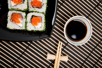 Sushi set served on a black plate
