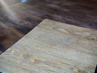 Cover paper or book, empty space, on wood table