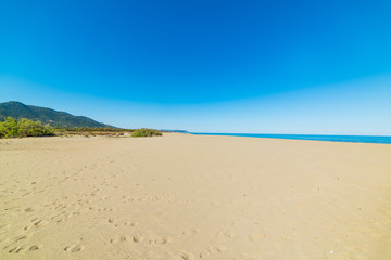Fototapeta na wymiar Sandy shore in San Giovanni beach