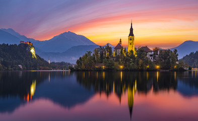 Fairytale, multi-colored dawn over Lake Bled in Slovenia