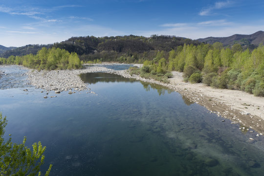 Sesia river (Valsesia, Piedmont, Italy), in springtime increases the flow rate of water due to the melting of glaciers.
