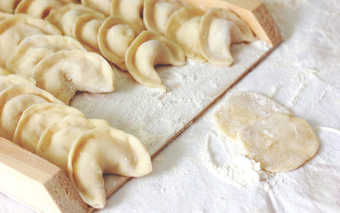 Preparation Baking Cooking Kitchen Table with Flour and Dunplings