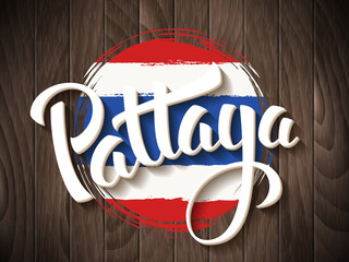 Obraz premium Pattaya vector lettering and thai national flag on vintage wooden background. Pattaya city hand drawn typography. Vintage calligraphy design