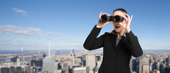 Manager searching for new opportunities using binoculars