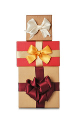 Set of beautiful gift boxes with wonderful bows of shiny ribbons on white background