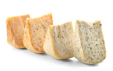 Set of various cheeses on white background
