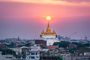 Zelfklevend Fotobehang Twilight time : the Golden Mount at Wat Sraket Rajavaravihara temple, Travel Landmark of Bangkok, Thailand © ahimaone