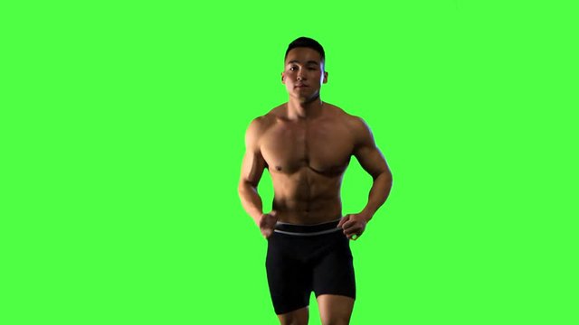 Sportsman energy runs on the green screen background. Front view