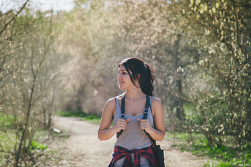 Young woman walking on the field