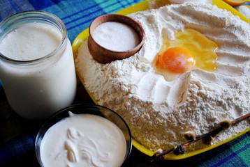 Traditional Easter cake kulich , freshly baked Easter bread , Easter recipe composition