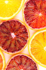slices of fresh blood orange fruits food background texture
