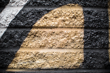 Gold and Black Brick Wall Background 