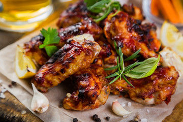 Chicken wings in on wood board