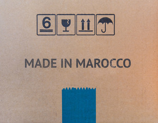 Made in MAROCCO written on brown cardboard box.