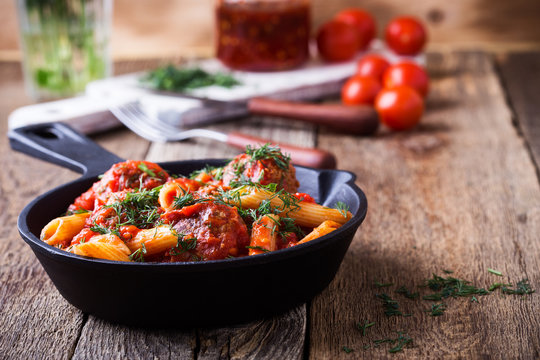 Meatball with penne pasta with spicy red sauce