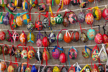 Multicolored easter eggs on a textile background