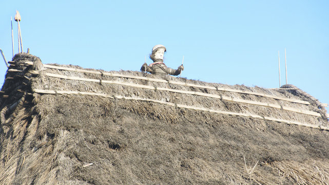 Rooftop detail Bena traditional village with grass huts of Ngada people in Flores near Bajawa, Indonesia.