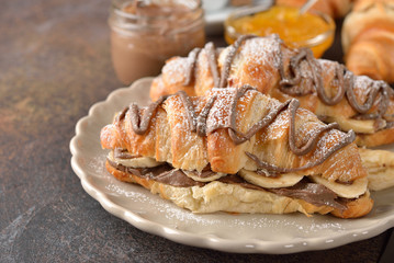 Croissant with banana and chocolate