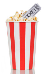 Fototapeta premium Large striped popcorn box with gray cinema ticket on white.