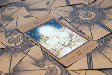 Fototapeta na wymiar Tarot card The Star. Labirinth tarot deck. Esoteric background.