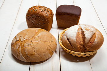Bread on a white wooden background