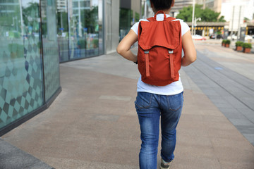 Obraz premium young asian woman walking on street