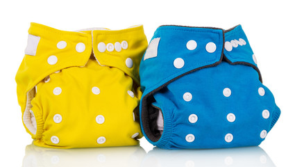 Two modern eco friendly diaper isolated on white.