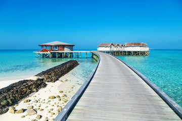 Water bungalows resort at islands. Indian Ocean, Maldives