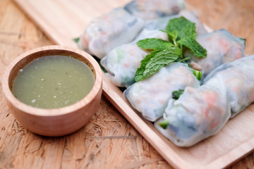 Asian spring rolls with spicy sauce