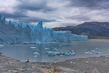 view of a glacier of Perito Moreno and ice floes in lake Argentino