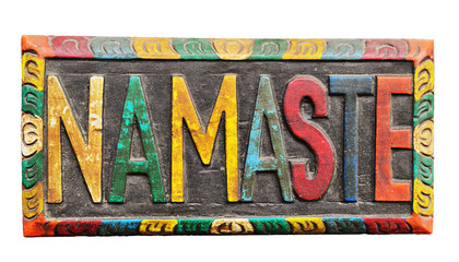 Colorful painted wooden plate with carving namaste (traditional grating) isolated on white background with work path.