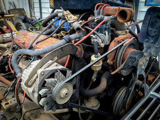 Vintage motor out of old truck sitting on palette