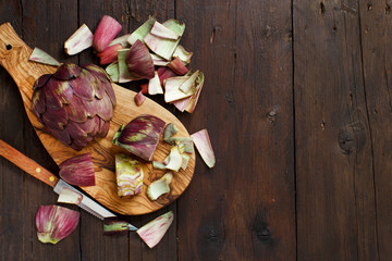 Roman Artichokes on a wooden board