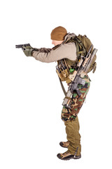 private military contractor aiming with black pistol.