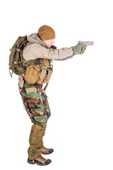 private military contractor aiming with black pistol.
