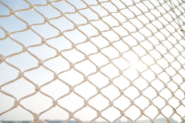 Fototapeta premium Closeup of soccer goal net..