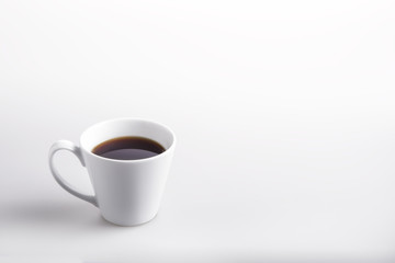  Black coffee in white cup on white background.