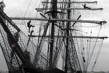 working in the rigging on a traditional tallship