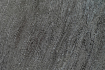 Closeup surface marble pattern at the black marble stone wall texture background