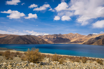 Beautiful landscape of Pangong lake over blue sky in Leh Ladakh, India.