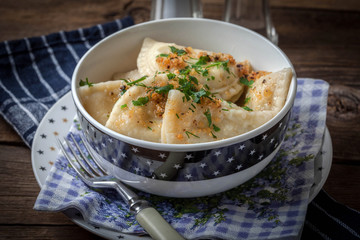 Dumplings with meat, onion and bacon.