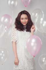 Asian beauty fashion woman with pastel balloons