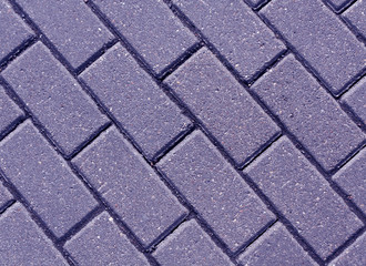 Blue color cobblestone pavement close-up